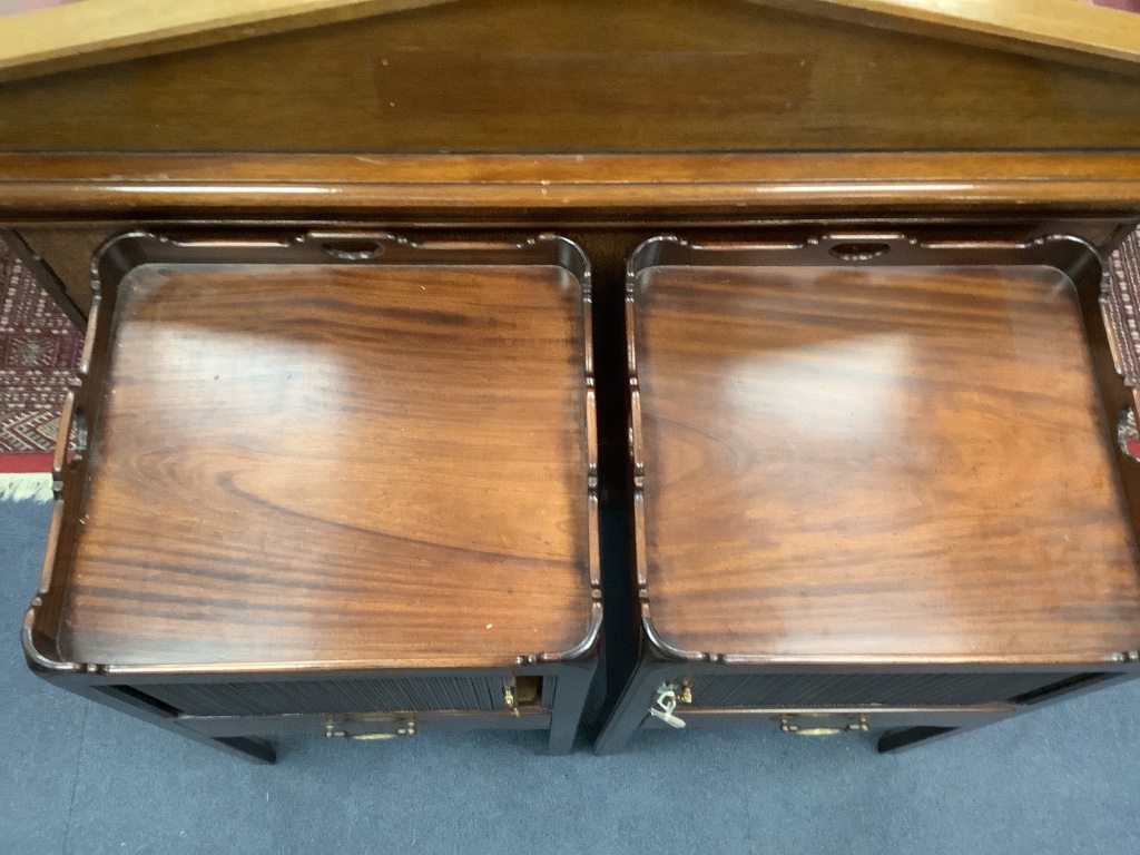A pair of Georgian style mahogany tray-top bedside commodes, each having tambour shutter on square supports, width 48cm depth 42cm height 79cm